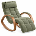 Fauteuil à bascule vert capitonné avec repose-jambes prolongé